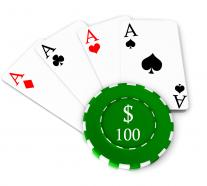 Poker chip with hundred dollar value and four aces stock photo