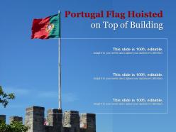 Portugal flag hoisted on top of building