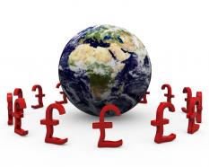 Pounds with globe showing finance stock photo