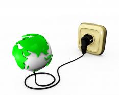 Power connection with plug and globe technology stock photo