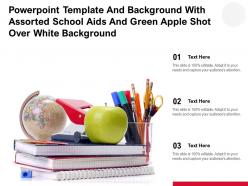 Powerpoint template with assorted school aids and green apple shot over white background