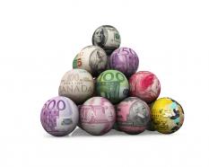 Pyramid of balls showing world currencies stock photo