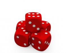 Pyramid of red and white dices showing gaming concept stock photo