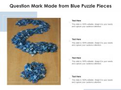 Question mark made from blue puzzle pieces