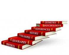 Red books in stacks with different subject text stock photo