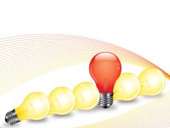 Red Bulb Standing Among Yellow Bulbs Showing Idea Generation Stock Photo