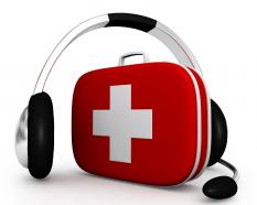 Red first aid box with head phone stock photo