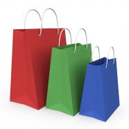 Red green and blue colored shopping bags stock photo