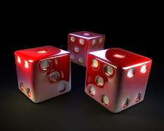 Red three dices on black background stock photo