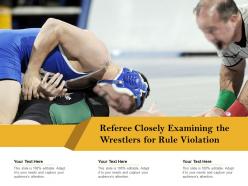 Referee closely examining the wrestlers for rule violation