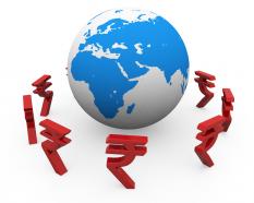 Rupee Symbols Around The Globe Showing Finance And Marketing Stock Photo