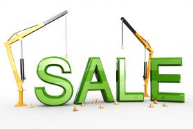 Sale text with two cranes stock photo