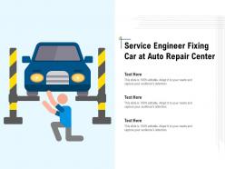 Service Engineer Fixing Car At Auto Repair Center