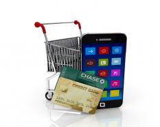 Shopping Cart With Credit Cart And Mobile Phone Stock Photo