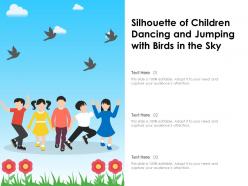 Silhouette of children dancing and jumping with birds in the sky