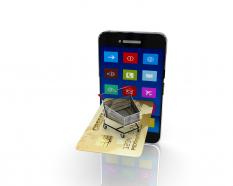 Smart phone with credit card on white background stock photo
