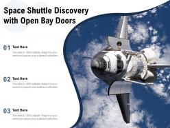 Space shuttle discovery with open bay doors