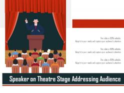 Speaker on theatre stage addressing audience