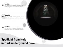 Spotlight from hole in dark underground cave
