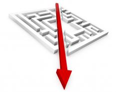 Square maze with red directional arrow showing growth stock photo