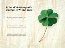 St patricks day image with shamrock on wooden board