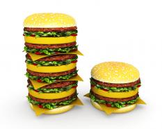 Stack of hamburgers shows health and food concept stock photo