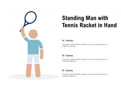 Standing man with tennis racket in hand
