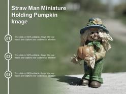 Straw man miniature holding pumpkin image