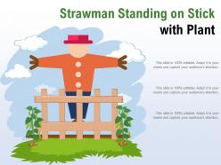 Strawman standing on stick with plant