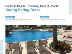 Sunbeds beside swimming pool at resort during spring break