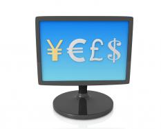 Symbol of world currencies on computer screen stock photo