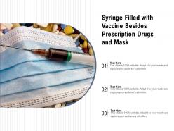 Syringe filled with vaccine besides prescription drugs and mask