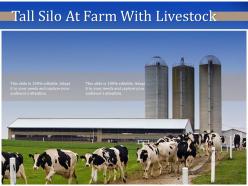Tall silo at farm with livestock