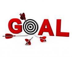 Target dart arrow in the middle with goal word stock photo