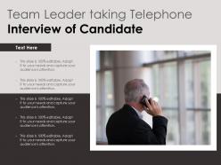 Team leader taking telephone interview of candidate