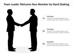 Team leader welcome new member by hand shaking