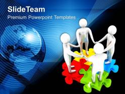 Team on colorful jigsaw puzzles global powerpoint templates ppt themes and graphics