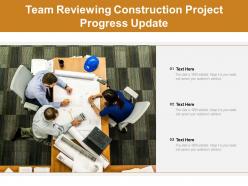 Team reviewing construction project progress update
