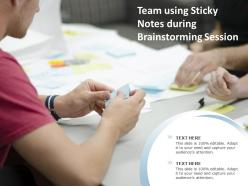 Team using sticky notes during brainstorming session