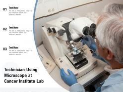 Technician using microscope at cancer institute lab