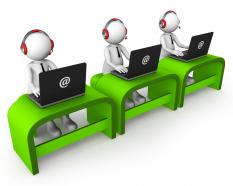 Three 3d men with laptops for customer support stock photo