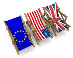 Three chairs with flags of america china and europe stock photo