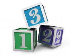 Three colorful cubes with 123 numbers on it stock photo