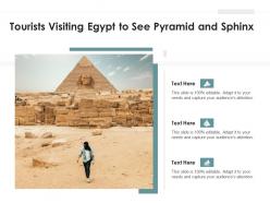 Tourists visiting egypt to see pyramid and sphinx