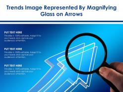 Trends Image Represented By Magnifying Glass On Arrows