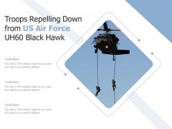 Troops repelling down from us air force uh60 black hawk