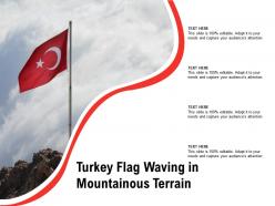 Turkey flag waving in mountainous terrain