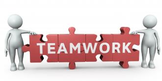 Two 3d men with teamwork puzzle stock photo
