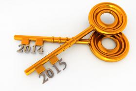 Two golden keys with year 2014 and 2015 stock photo