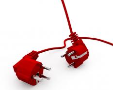 Two red plugs for business concepts stock photo